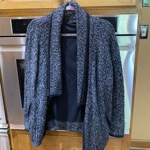 Black with white flecks in the wool blend sweater